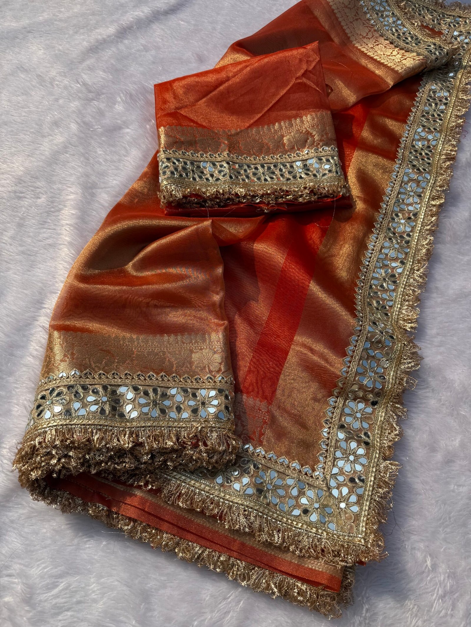 Orange tissue saree with lace